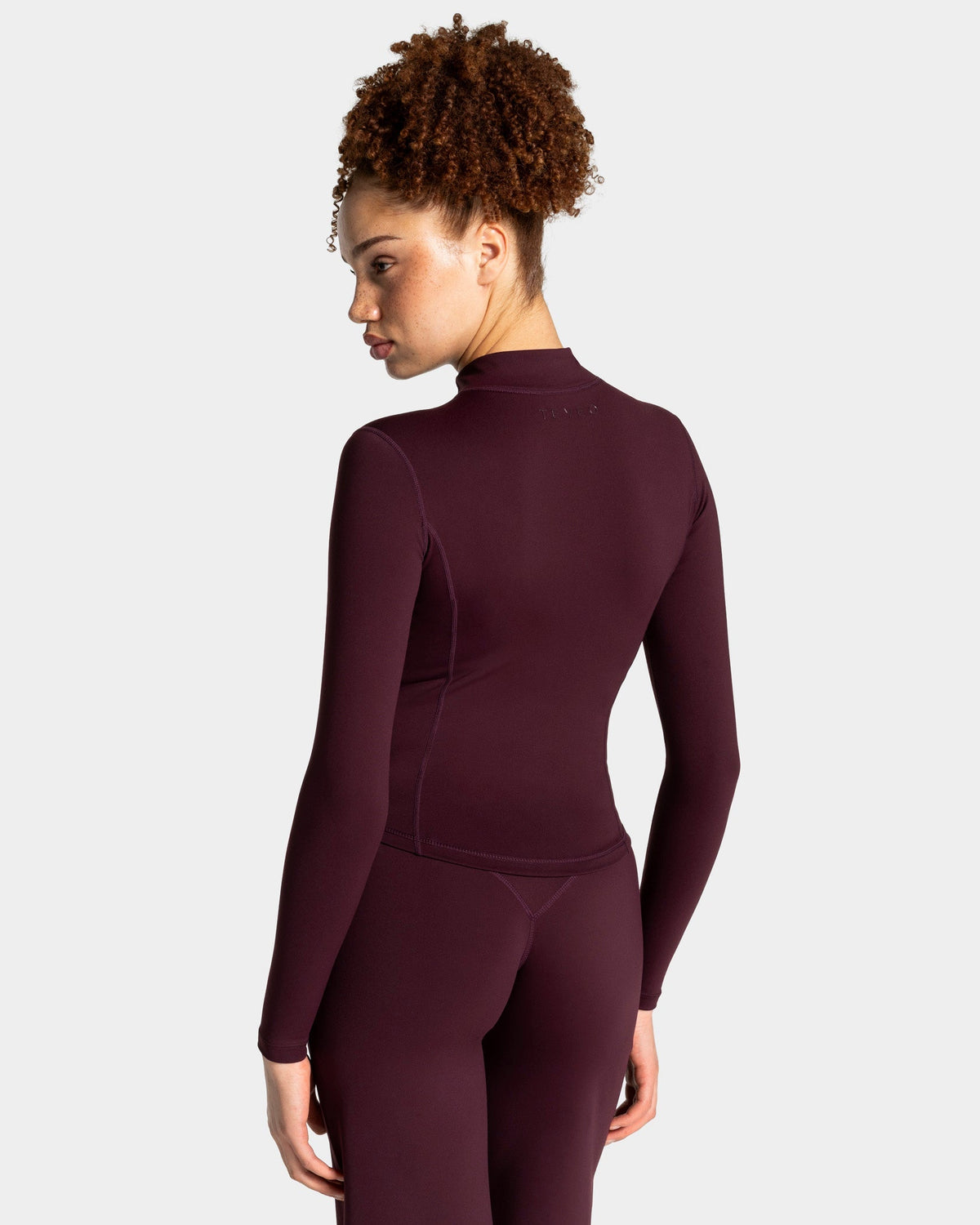 Veste de sport zippée sculptante Allrounder « merlot/dorée »